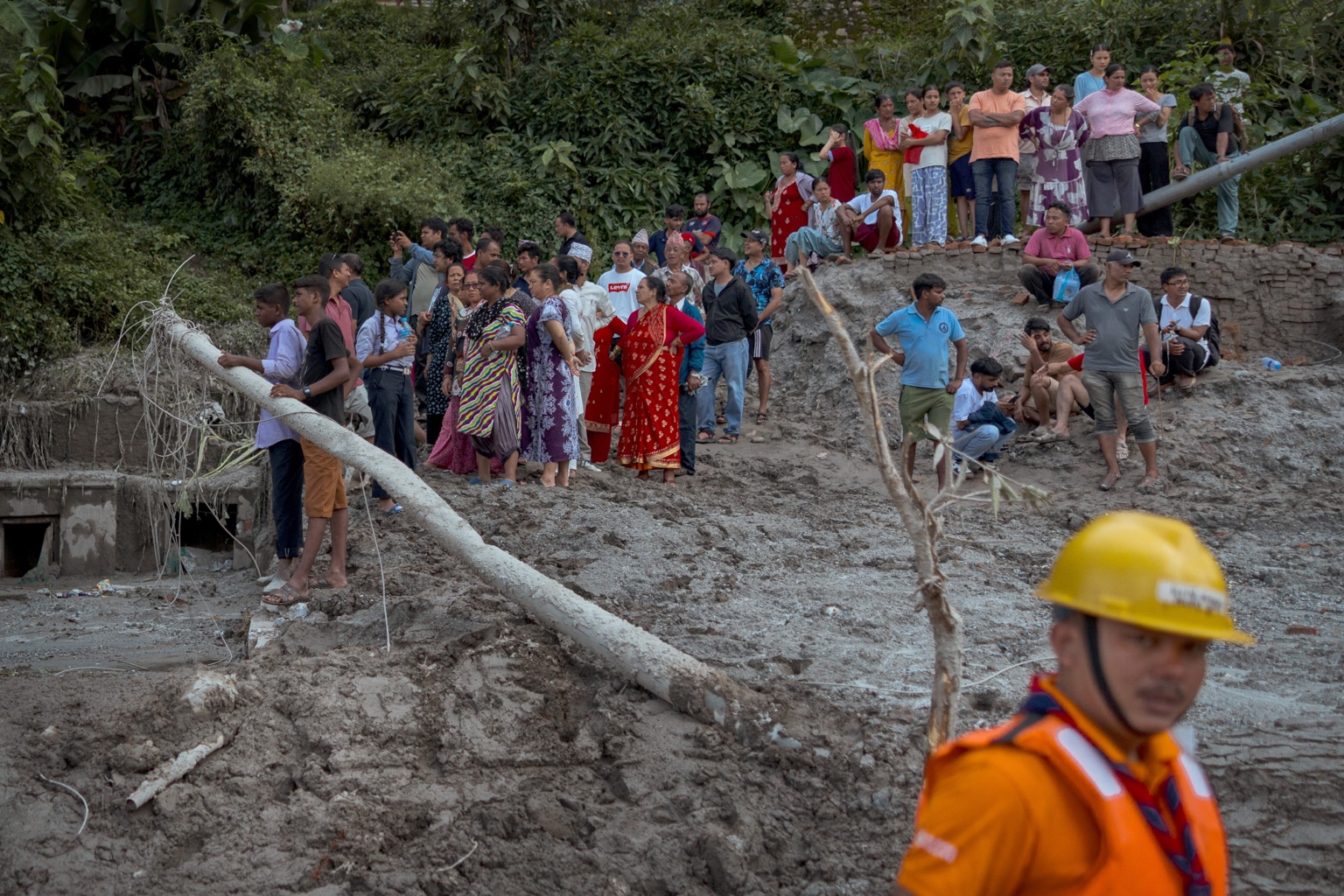 Residents and responders in a flood affected area of Nepal
